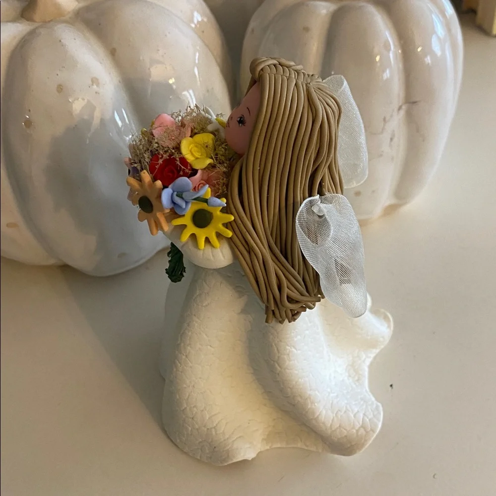 Kneeded Angel Figurine with Pastel Floral Bouquet